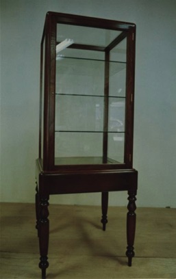 One of a pair of Colonial style display cabinets for the client's pipe collection
